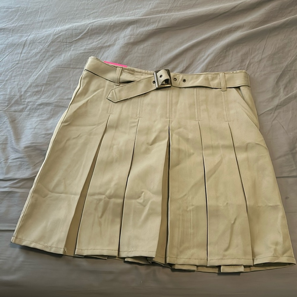 These is a khaki, skort by the brand “French Toast”